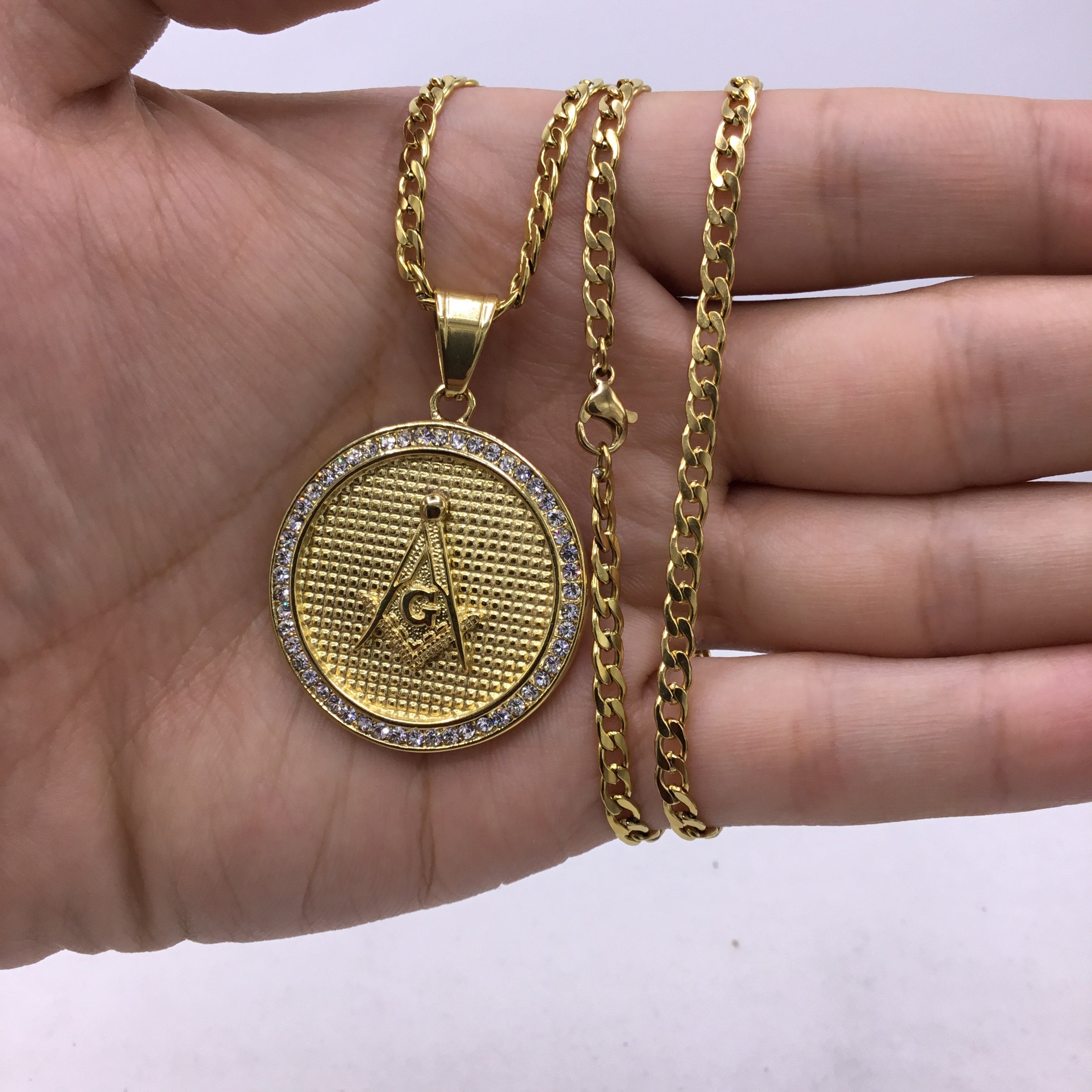 18k gold over stainless steel Medallion with Cubic Zirconia includes Cuban link chain set